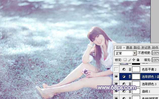 ‘Photoshop为绿草中的美女加上梦幻的青蓝色‘