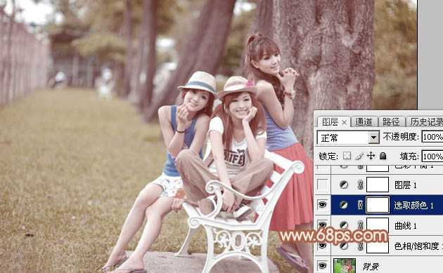 ‘Photoshop为树边的美女加上柔美的中性淡红色‘