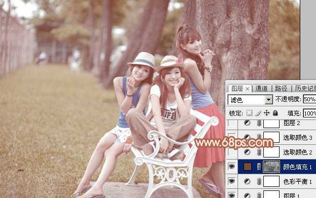 ‘Photoshop为树边的美女加上柔美的中性淡红色‘