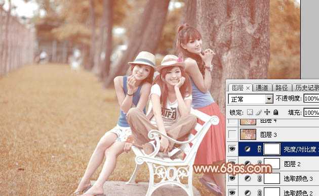 ‘Photoshop为树边的美女加上柔美的中性淡红色‘