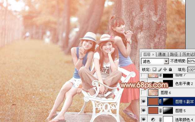 ‘Photoshop为树边的美女加上柔美的中性淡红色‘