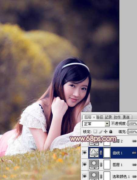 ‘Photoshop将草地上的美女调制出柔美的橙紫色‘