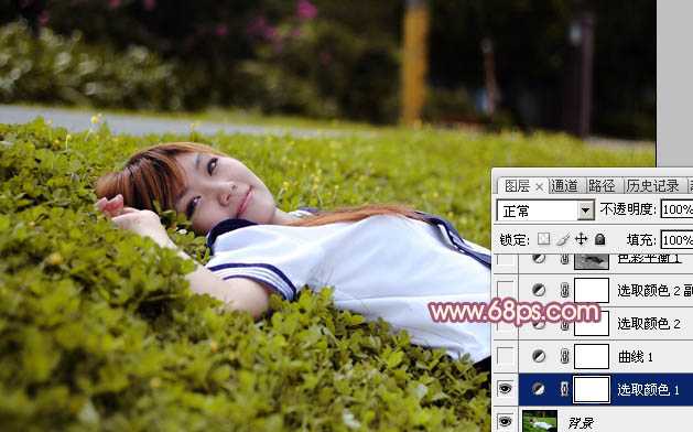 ‘Photoshop将躺草地上的美女打造出柔和的秋季红褐色‘