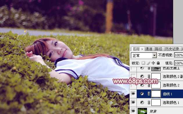 ‘Photoshop将躺草地上的美女打造出柔和的秋季红褐色‘