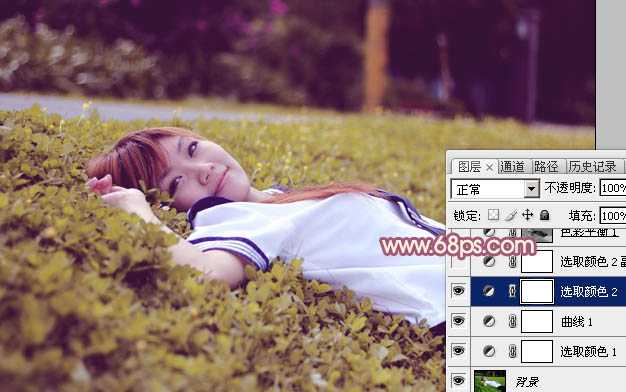 ‘Photoshop将躺草地上的美女打造出柔和的秋季红褐色‘