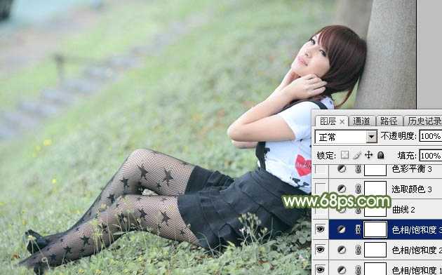 ‘Photoshop给夏季草地上的美女加上唯美的韩系淡绿色‘
