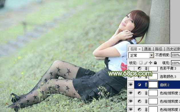 ‘Photoshop给夏季草地上的美女加上唯美的韩系淡绿色‘