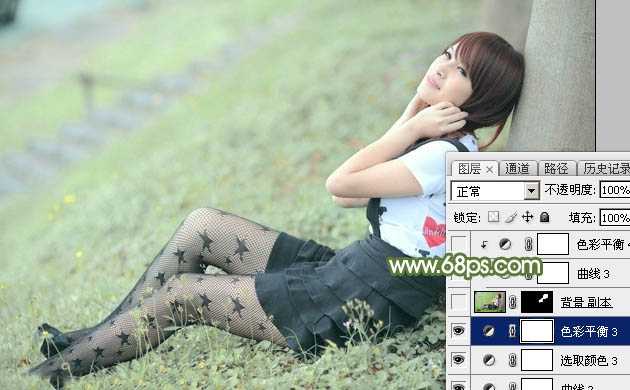 ‘Photoshop给夏季草地上的美女加上唯美的韩系淡绿色‘
