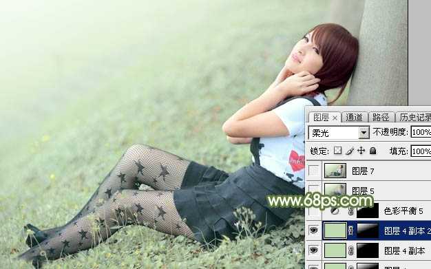 ‘Photoshop给夏季草地上的美女加上唯美的韩系淡绿色‘