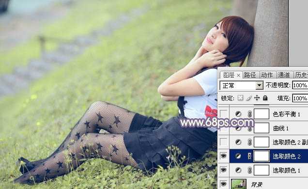 ‘Photoshop为倚靠树边的美女增加柔美的淡调蓝黄色‘