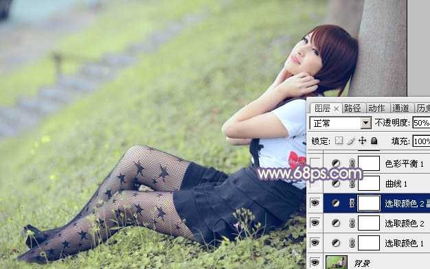 ‘Photoshop为倚靠树边的美女增加柔美的淡调蓝黄色‘