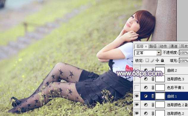 ‘Photoshop为倚靠树边的美女增加柔美的淡调蓝黄色‘