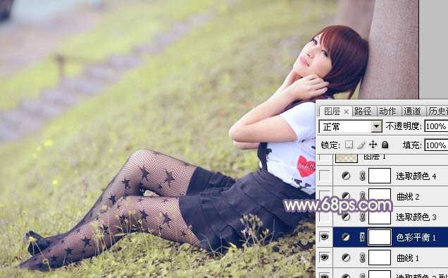 ‘Photoshop为倚靠树边的美女增加柔美的淡调蓝黄色‘