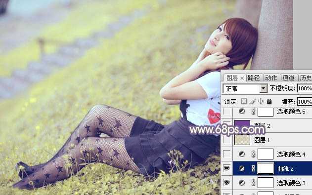‘Photoshop为倚靠树边的美女增加柔美的淡调蓝黄色‘