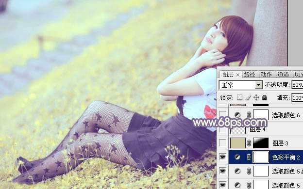 ‘Photoshop为倚靠树边的美女增加柔美的淡调蓝黄色‘